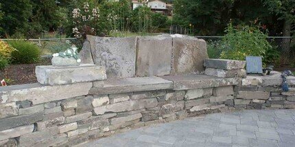 natural stone garden wall and flagstone seating nanaimo