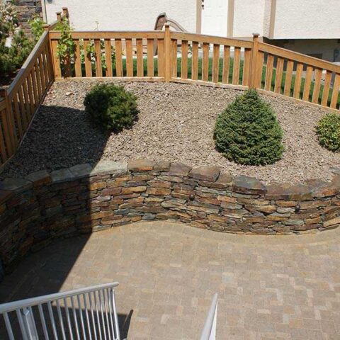kendall ledge wall with spruce trees - hard surfaces nanaimo