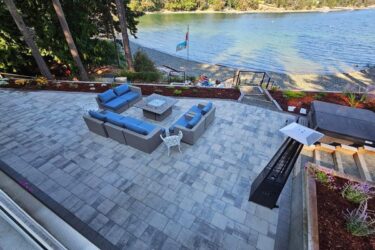 lakeside terrace with hot tub and fire table in Nanaimo BC