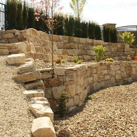 hard surface installation - rock wall landscaping